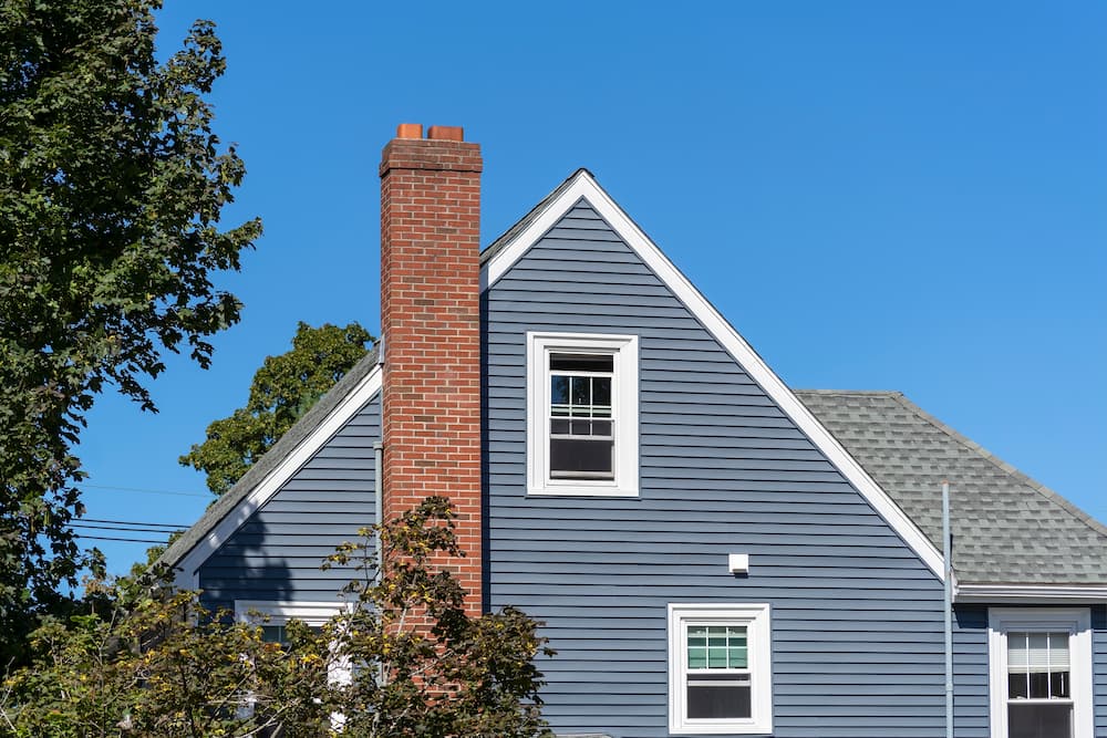 Midtown Chimney Services team inspecting fresh masonry work
