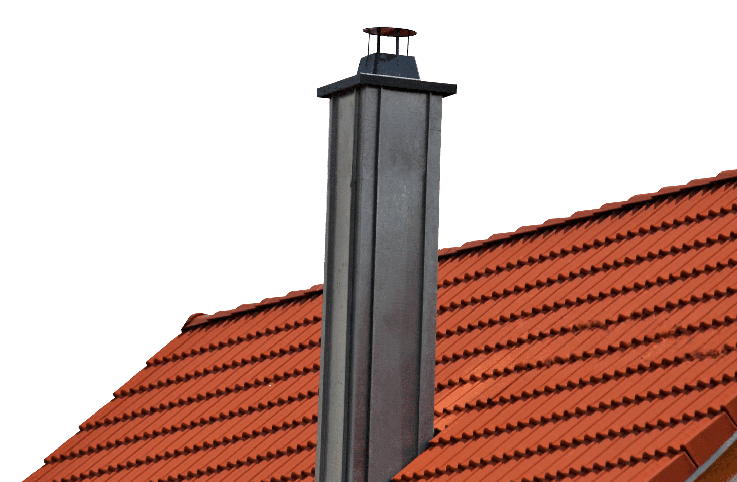 A tall gray chimney rises through a red tiled roof.