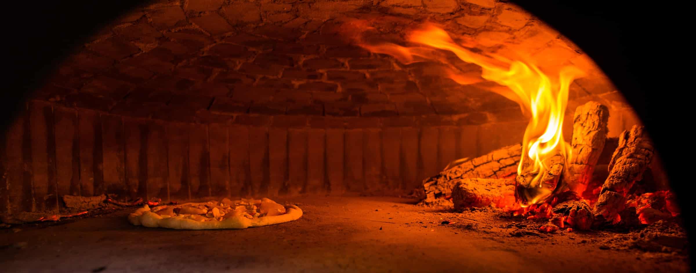 Wood fire burning in a commercial open hearth